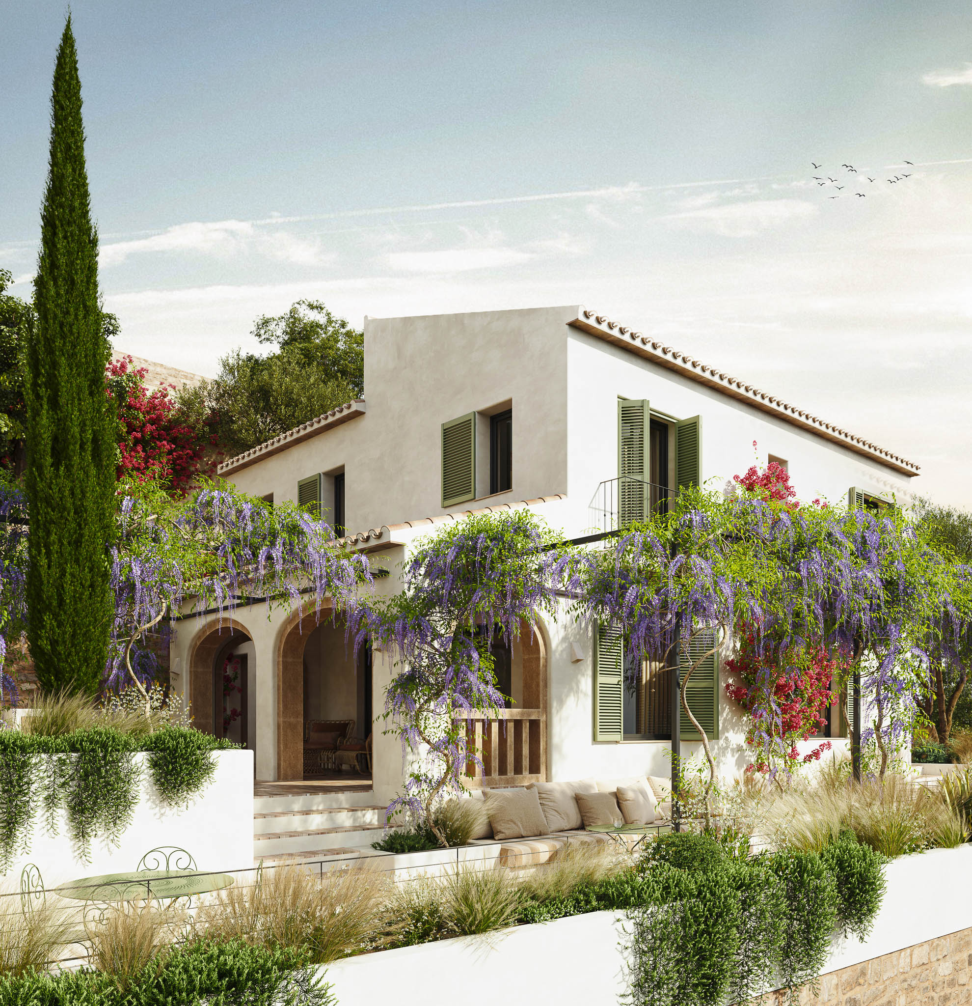 Lush Mediterranean garden and arched terrace at Casa Llicsó in Jávea.